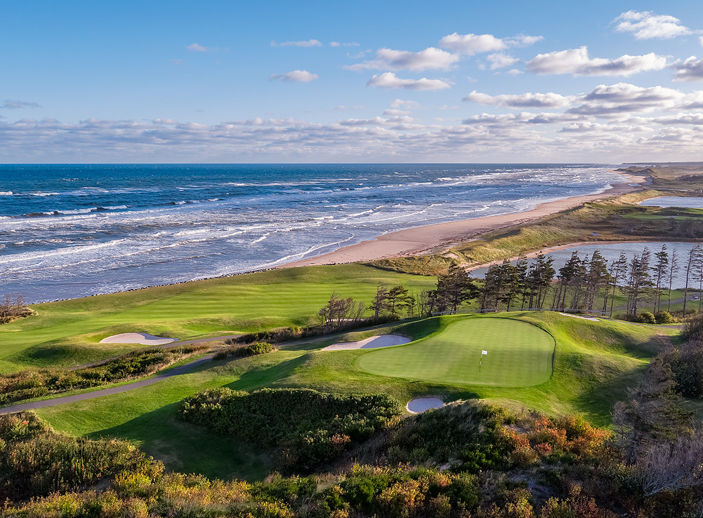 Coastal signature hole at Crowbush Cove on Prince Edward Island with dunes and the Gulf of St. Lawrence